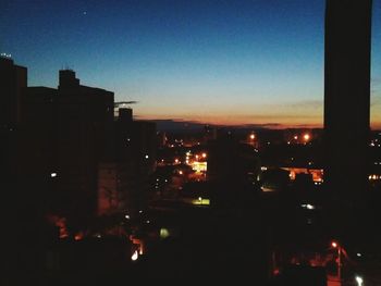 Illuminated cityscape at night