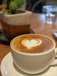 Close-up of cappuccino on table