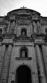 Low angle view of old building against sky