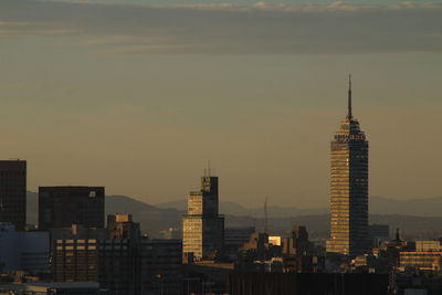 Cityscape against sky during sunset