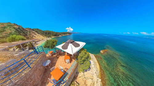 High angle view of beach against blue sky