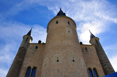 Low angle view of church against blue sky