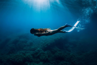 Man swimming in sea