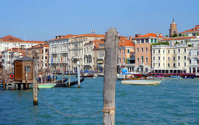 Boats moored in canal