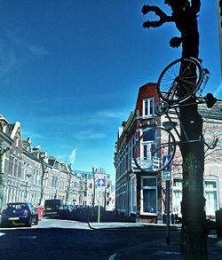 View of buildings against blue sky