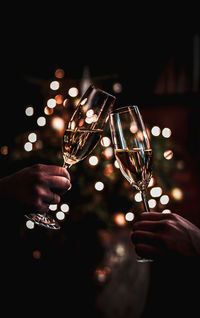 Close-up of hand holding wine glass