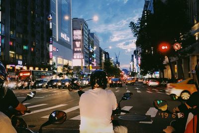 Rear view of traffic on city street