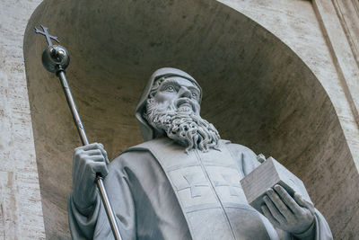 Low angle view of statue against the wall