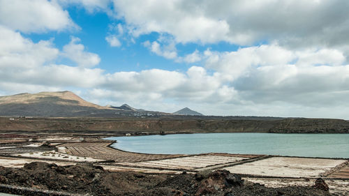 Scenic view of lanzarote salt basins against sky