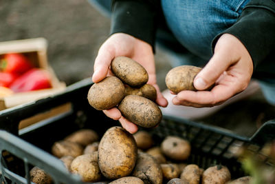 Midsection of man preparing food