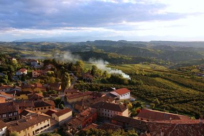 High angle view of townscape against sky at sunset in diano d'alba, piedmont 