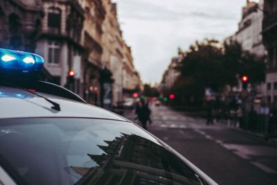 Close-up of car on street