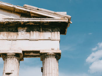 Low angle view of an ancient greek temple against sky