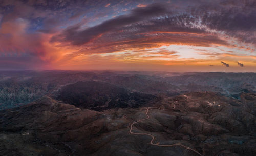 Aerial view of landscape against sky during sunset