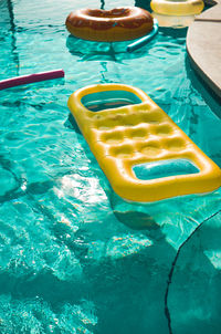 High angle view of floating in swimming pool