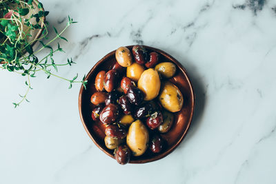 High angle view of fruits in bowl on table