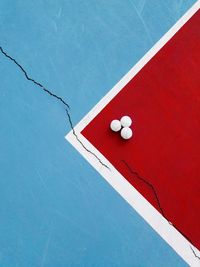High angle view of red ball on table