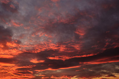 Low angle view of dramatic sky during sunset