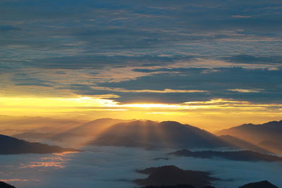 Scenic view of dramatic sky during sunset