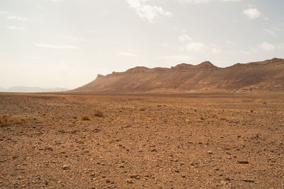 Scenic view of desert against sky