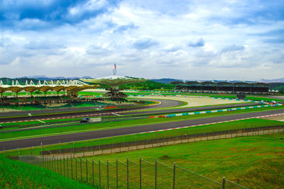 Scenic view of agricultural field against sky