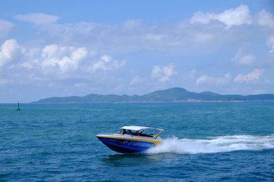 Boat on sea against sky