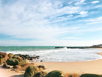 Scenic view of beach against sky