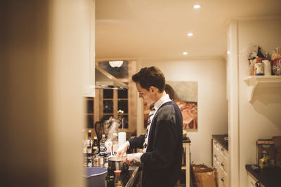 Man standing in restaurant