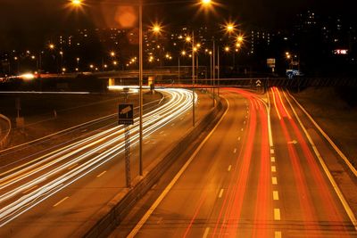 High angle view of light trails on city street