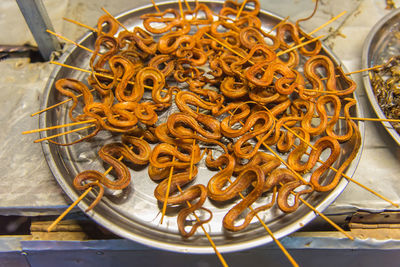 Grilled snakes on sale for food market in china.