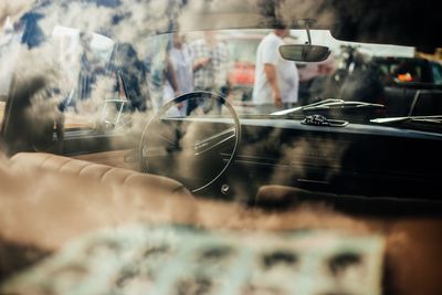 Reflection of people on glass