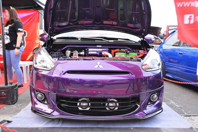 Close-up of multi colored cars on road