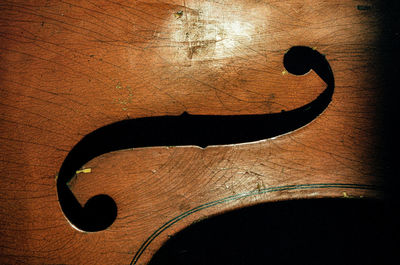 High angle view of human face on wood