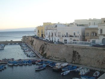 Panoramic view of sea and buildings against clear sky