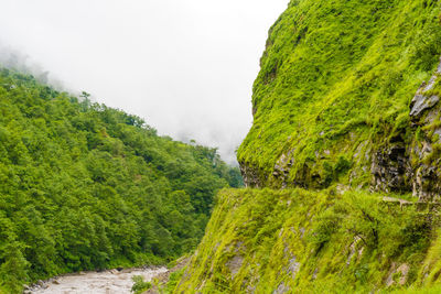 Scenic view of land against sky