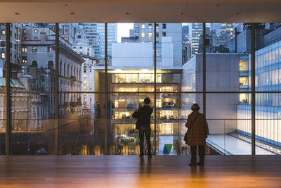 People walking in modern office building