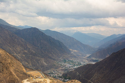 Landscape scenery on the road between lijiang and shangri-la, high altitude mountains, small village
