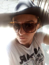 Portrait of young man wearing sunglasses