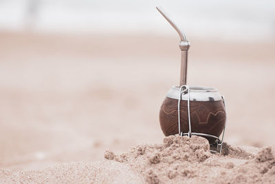 Close-up of light bulbs at beach