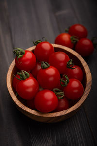 Close-up of tomatoes in basket on table