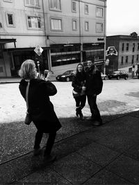 Woman standing in city