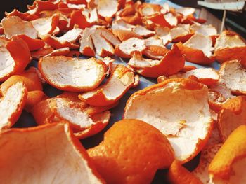 Full frame shot of orange peels drying on table