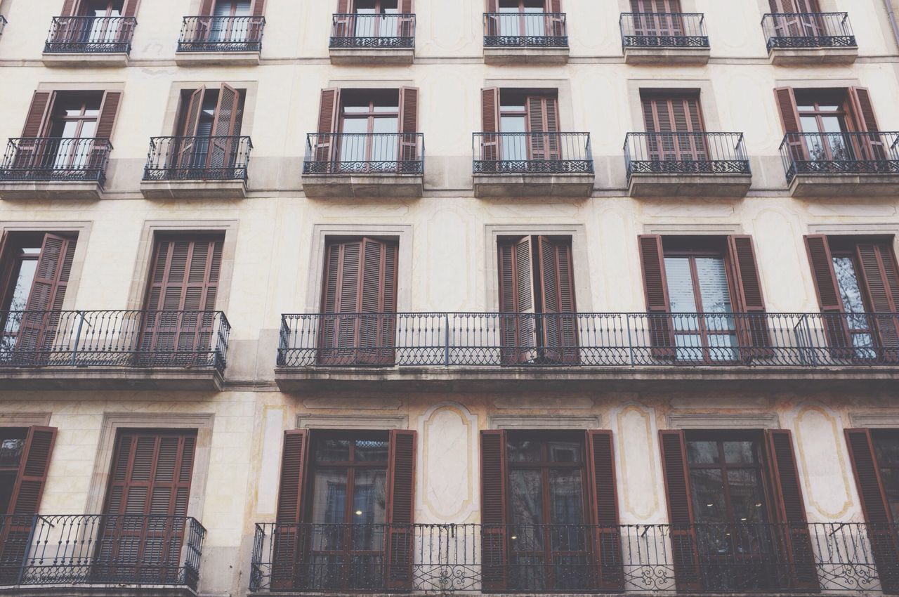 architecture, building exterior, window, built structure, full frame, low angle view, building, residential building, backgrounds, balcony, residential structure, facade, city, glass - material, day, outdoors, repetition, no people, side by side, in a row