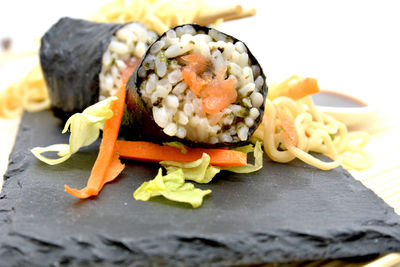 Close-up of sushi served on table