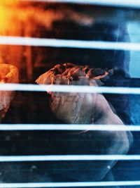 Digital composite image of fire on window