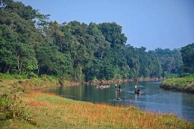 Sailing along the river in chitwan national park, nepal