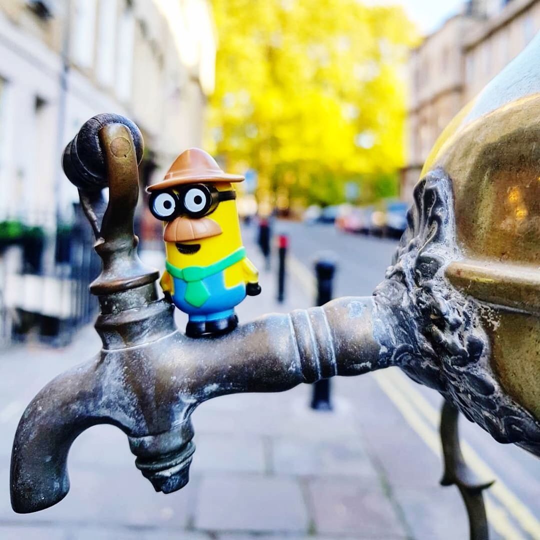 animal representation, focus on foreground, representation, architecture, art and craft, no people, close-up, day, creativity, water, sculpture, built structure, outdoors, fountain, faucet, nature, animal, building exterior, statue, flowing water, silver colored, running water