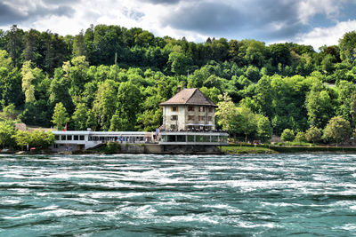 Rhine river flows its way ahead after passing the falls near schaffhausen in switzerland 20.5.2020