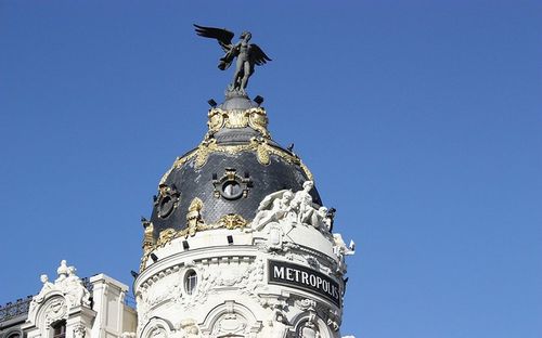 Low angle view of built structure against clear blue sky