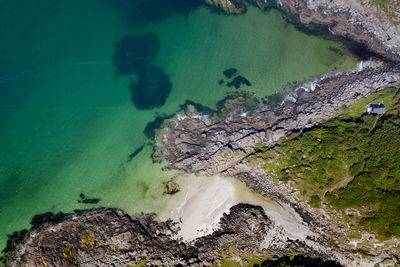 High angle view of rocks on beach